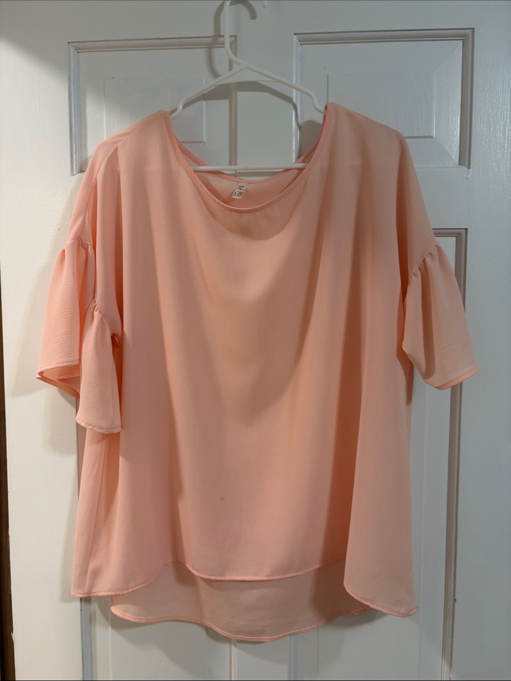 Relaxed Ruffle Sleeve Top in Light Peach